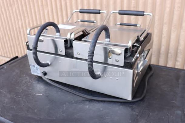 Brand new Waring WFG300 Panini Grill, scratch-n-dent, dual smooth surfaces, 17"x9.25" cooking, 240V, 3120W.