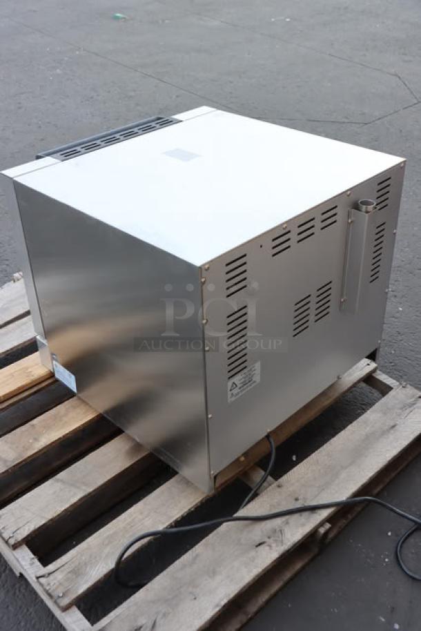 Brand new Moffat E23M3-T Turbofan convection oven, half-size, electric, mechanical controls, 220-240V, 3 kW, on pallet.