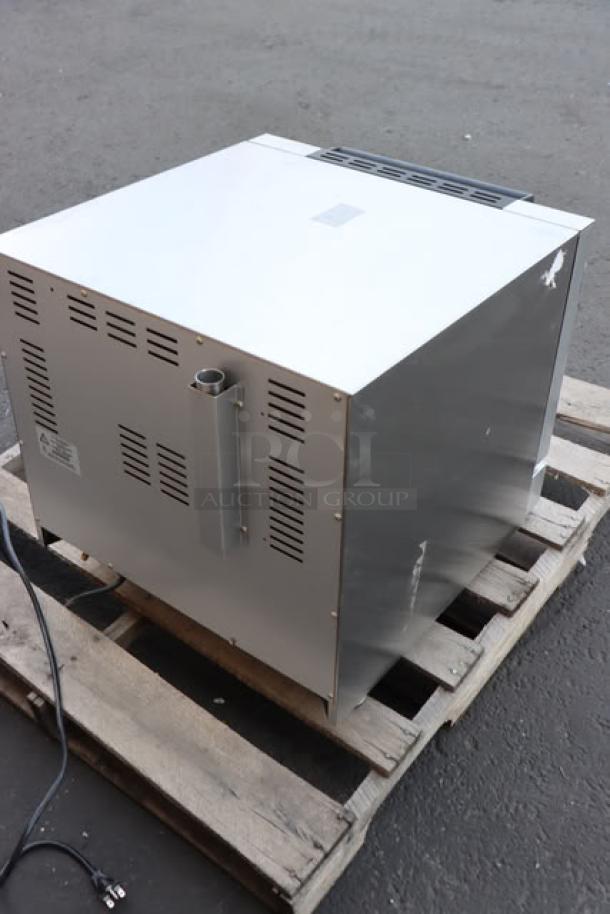 Brand new Moffat E23M3-T Turbofan convection oven, half-size, electric, 3 kW, 220-240V, on pallet, no packaging.