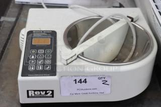ChocoVision C116USREV2WHI Revolation 2 chocolate tempering machine, 1.5 lb capacity, for parts, with visible control panel and markings.