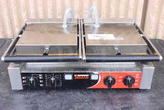 Sirman 34A3661105SI PD L Double Panini Grill, grooved top, smooth bottom plates, 10"x20" surface, used condition, 220V.