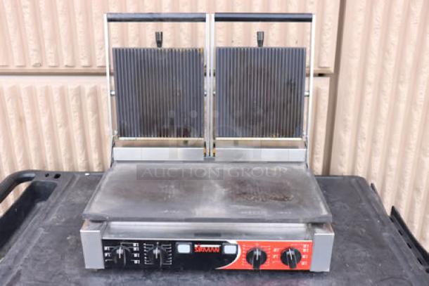 Sirman 34A3661105SI PD L Double Panini Grill, grooved top, smooth bottom, 10"x20" surface, used, scratches visible.