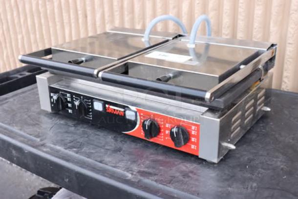 Sirman PD L Double Panini Grill, grooved top, smooth bottom, 10"x20" surface, model 34A3661105SI. Used, minor scratches.