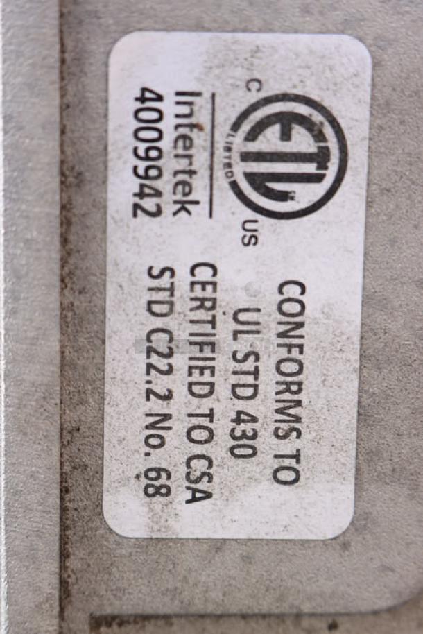 BRAND NEW Hobart FD4/125-1 Commercial Garbage Disposer, 1 1/4 hp, certification label shown, scratch-n-dent condition.