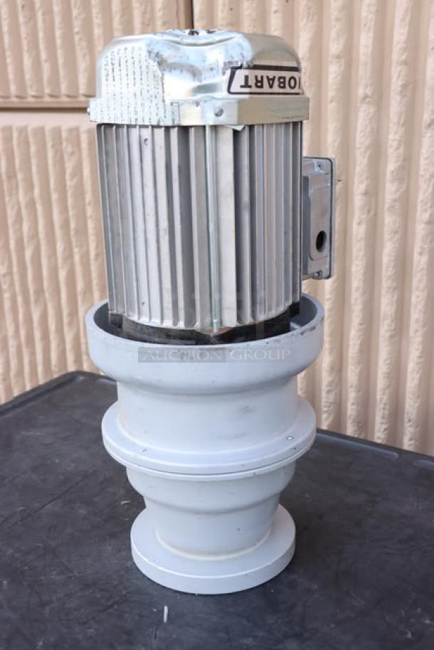 Brand new Hobart FD4/125-1 garbage disposer, 1 1/4 hp, 208-240/480V, short upper housing. Slight scratches on metal.