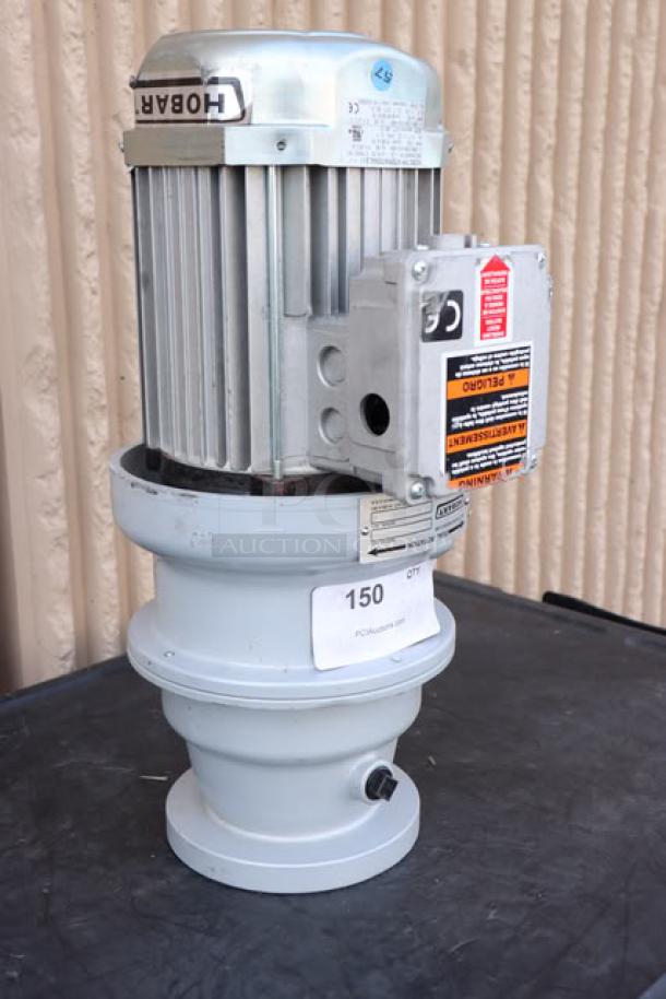 Brand new Hobart FD4/125-1 commercial garbage disposer, 1 1/4 hp, visible label, serial C010862-TBA, short upper housing.