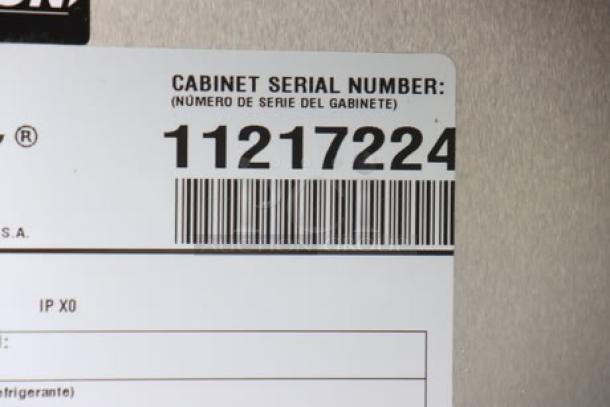Serial number label on True TMC-58-S-HC milk cooler, displaying S/N: 11217224.