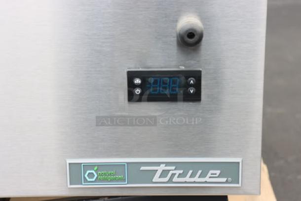 Brand new True TMC-58-S-HC milk cooler, stainless steel exterior, digital display, natural refrigerant label visible.