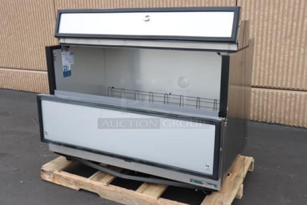 BRAND NEW True TMC-58-S-HC milk cooler with stainless steel exterior, aluminum interior, 58" wide. Model and serial tags visible.