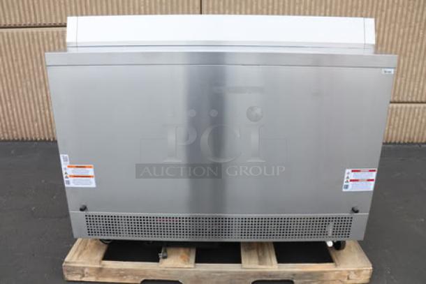 True TMC-58-S-HC milk cooler, brand new, stainless steel exterior, aluminum interior, 58 1/4", 115V, S/N: 11217224.