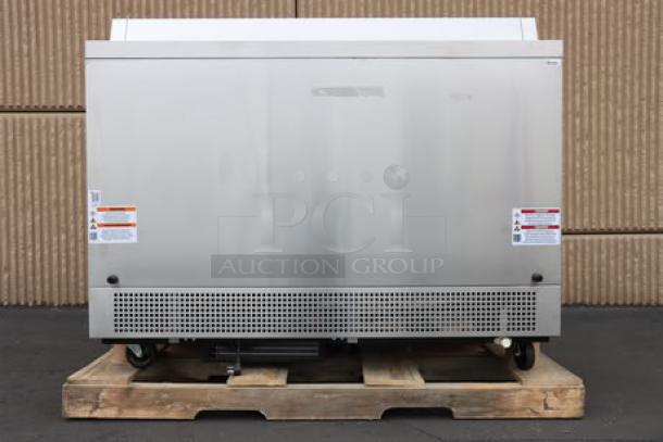 Brand new True TMC-58-S-HC milk cooler, stainless steel exterior, aluminum interior, model with tags, serial number 11217224.