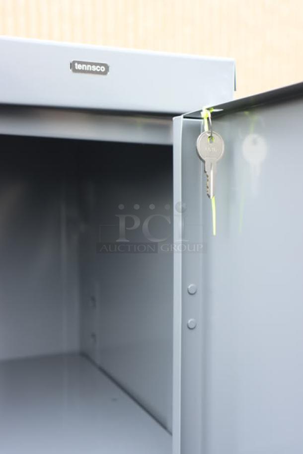 Tennsco 6618DH-MGY storage cabinet, dark gray, 18"x36"x66", solid doors, brand new with key, minor scratches, assembled.