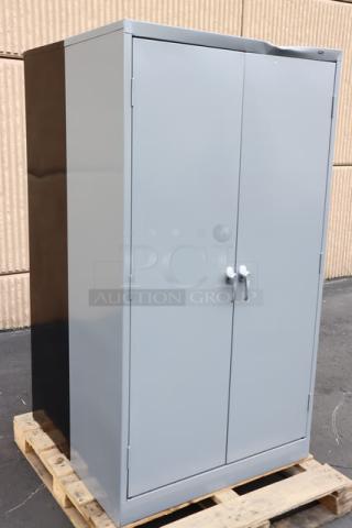 Tennsco 18"x36"x66" dark gray storage cabinet with solid doors, model 6618DH-MGY, new scratch-n-dent condition.