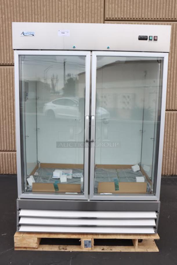 Brand new Avantco A-49R-G-HC 54" glass door refrigerator, 115V, tested, in working order, minor scratches, S/N: 005445656.