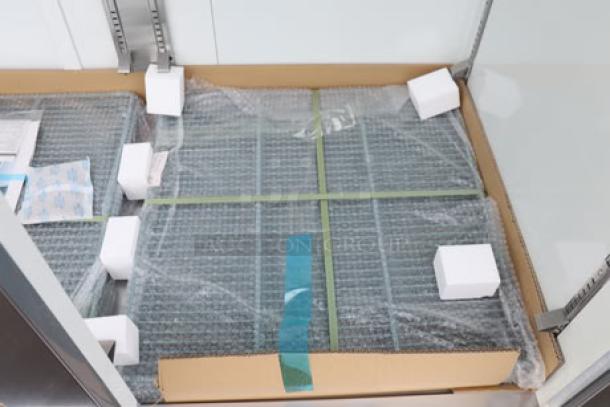 Avantco A-49R-G-HC 54" glass door refrigerator, brand new, tested, in working order. Minor scratches, 115V, model details visible.