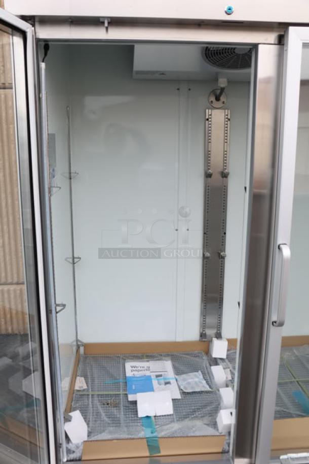 Brand new Avantco A-49R-G-HC glass door refrigerator, 54", tested and working, with visible internal shelving components.