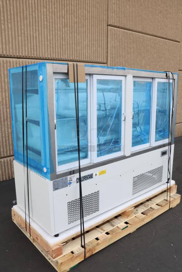 Brand new Avantco BCF-72-HC 70 7/8" refrigerated bakery display case. Features square glass panels, white finish, and labeled with S/N: 1588009170012. Out of original packaging.