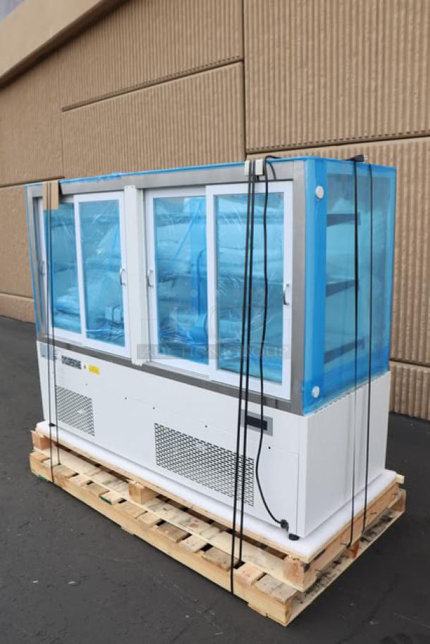 Brand new Avantco BCF-72-HC refrigerated bakery display case on pallet, white with square glass and protective wrapping.