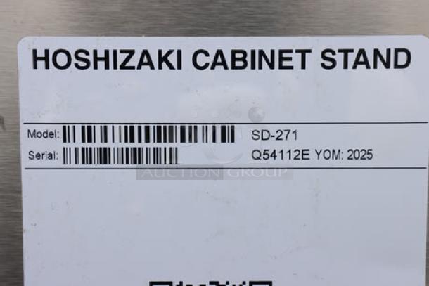 Hoshizaki SD-271 Ice Machine Stand, new, slight scratches and dents, lockable door, S/N: Q54112E, label visible.