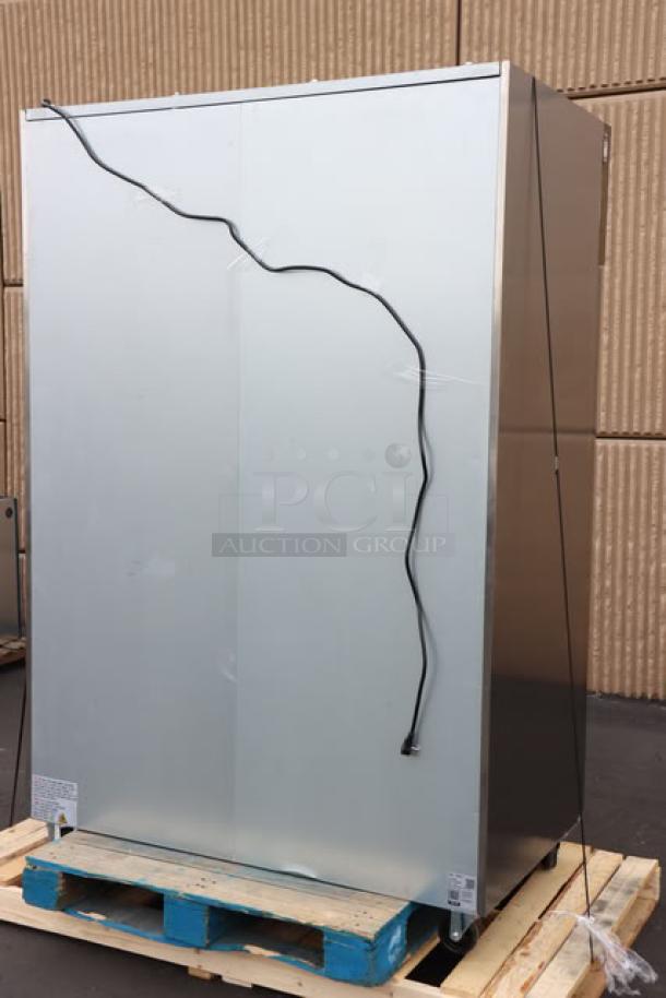 Avantco Z2-R-HC 54" stainless steel reach-in refrigerator, in working order, on a pallet. Power cord visible.