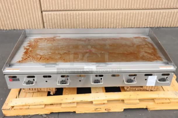 BRAND NEW Wolf by Vulcan AGM60-LP griddle, 60" gas, 135,000 BTU, missing legs, syrup spilled, manual controls visible.