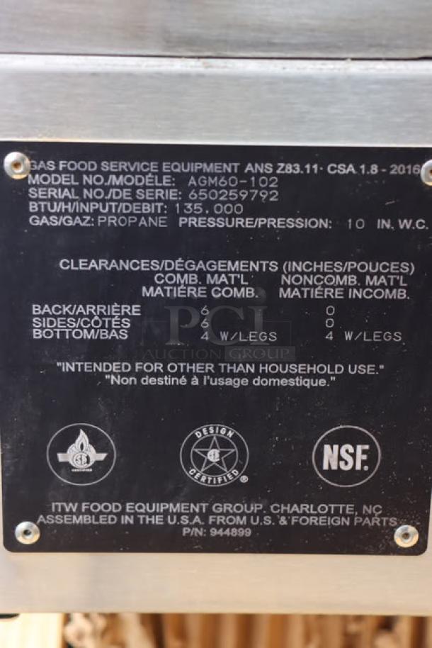 BRAND NEW SCRATCH-N-DENT Wolf by Vulcan AGM60-LP griddle, 135,000 BTU, serial 650259792; missing legs, syrup spill visible.