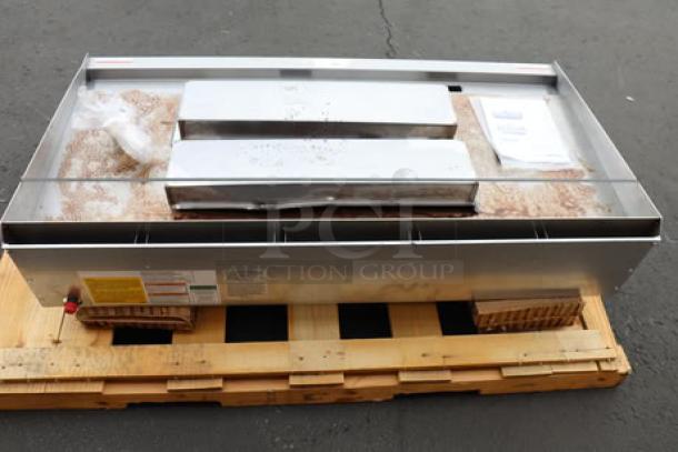 Wolf by Vulcan AGM60-LP 60" liquid propane griddle, 135,000 BTU, new scratch-n-dent, missing legs, syrup spilled on surface.