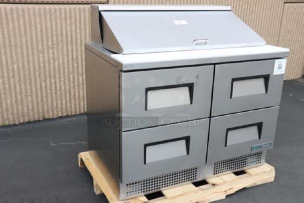 True TFP-48-18M-D-4-HC Mega Top Refrigerated Sandwich Prep Table, brand new, four drawers, minor scratches, on pallet.
