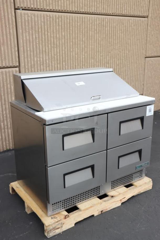 BRAND NEW True TFP-48-18M-D-4-HC Refrigerated Sandwich Prep Table, four drawers, 18 food pans, slight scratches/dents.