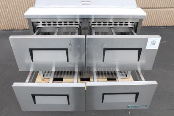 BRAND NEW True TFP-48-18M-D-4-HC 48" Mega Top Refrigerated Sandwich Prep Table, four drawers, visible minor scratches.