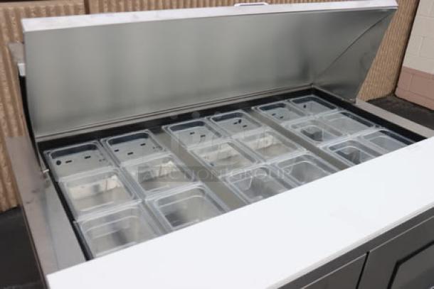 True TFP-48-18M-D-4-HC Mega Top Prep Table, 4 drawers, 18 food pans, 8" cutting board. Minor surface wear visible.