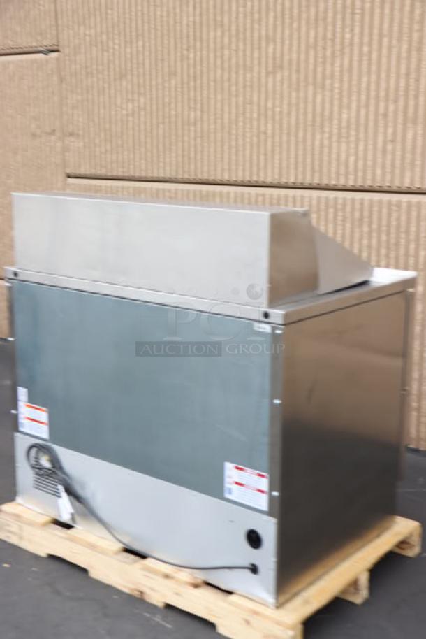 True TFP-48-18M-D-4-HC sandwich prep table, four drawers, new, minor scratches/dents, model details visible.