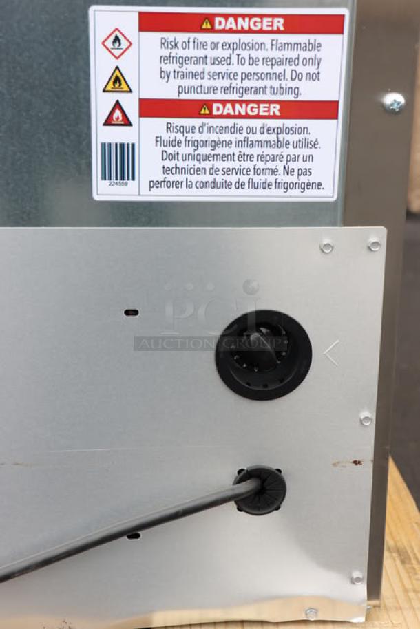 Safety label on True TFP-48-18M-D-4-HC prep table, advising caution with flammable refrigerant.