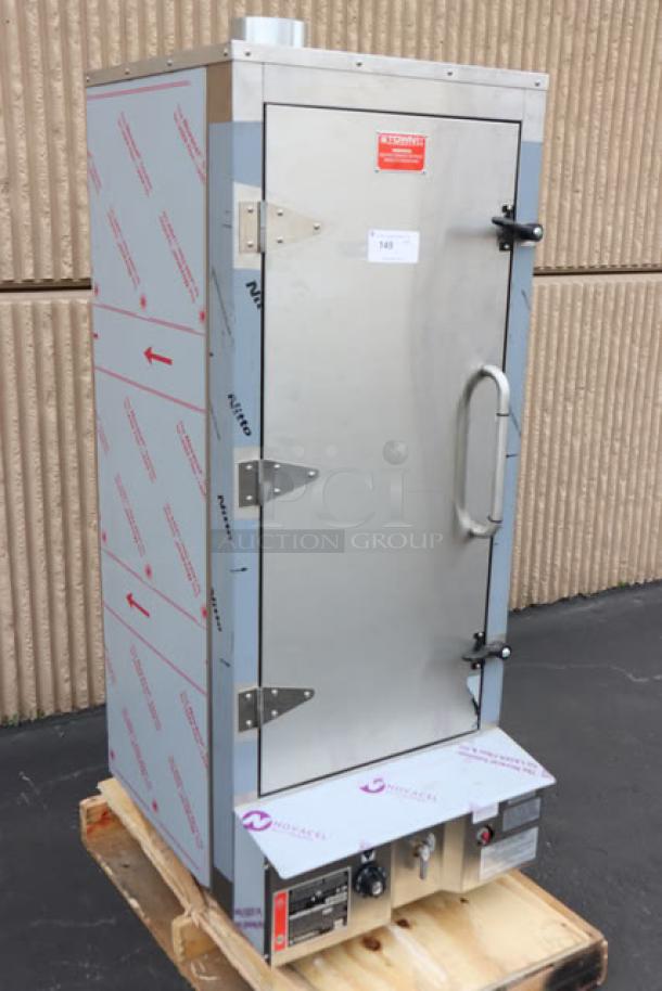 Brand new Town SM-24-L-SS 24" stainless steel smokehouse, 45,000 BTU, left door hinges, natural gas, serial 2643178.