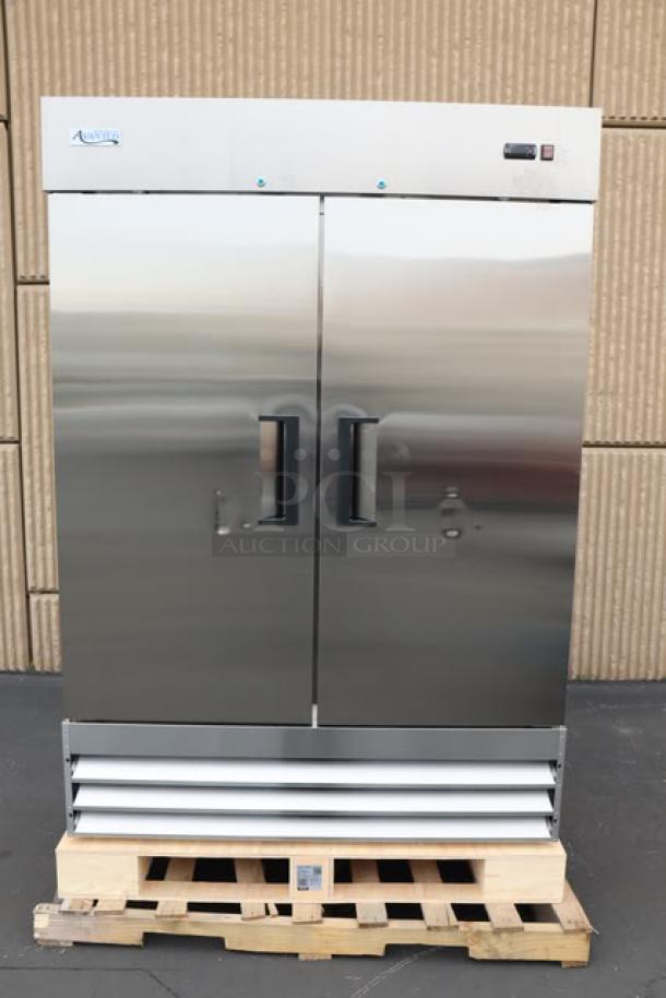 Brand new Avantco A-49F-HC 54" solid door reach-in freezer, stainless steel, 115V, unboxed, on a pallet.