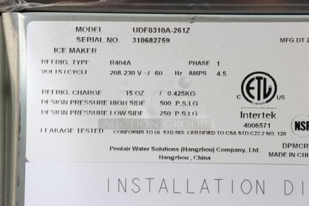 Manitowoc UDF0310A ice machine label showing model, serial number 310682759, specs, and certifications.