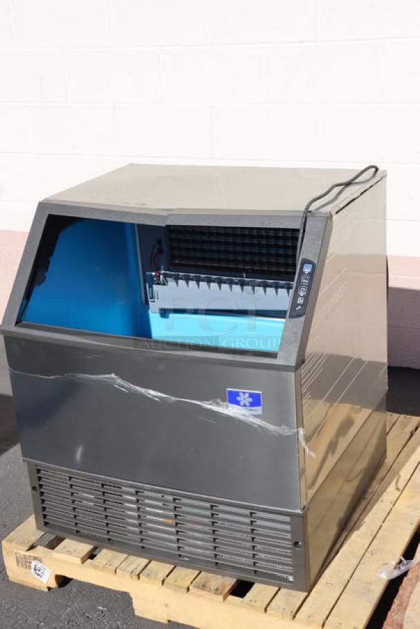 Brand new Manitowoc UDF0310A ice machine, 30" undercounter, 286 lb capacity, visible small dent, air-cooled, 208-230V, 1 Phase.