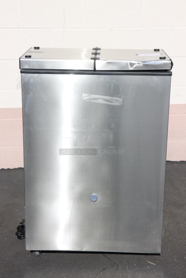 Brand new Excellence FT-4 25" four-tub ice cream freezer. Signs of scratching and denting visible. 115V, 1.4A, 1 phase.