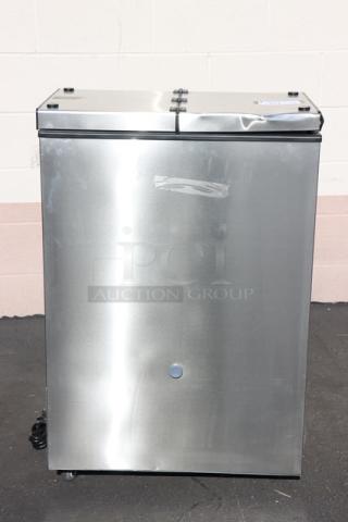 Brand new Excellence FT-4 25" four-tub ice cream freezer. Signs of scratching and denting visible. 115V, 1.4A, 1 phase.