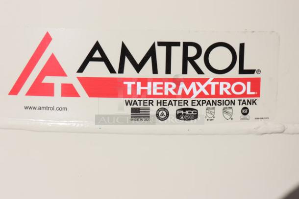 Brand new Amtrol Therm-X-Trol ST-210V 86-gallon vertical thermal expansion tank. Label shows minor scratches and dents.