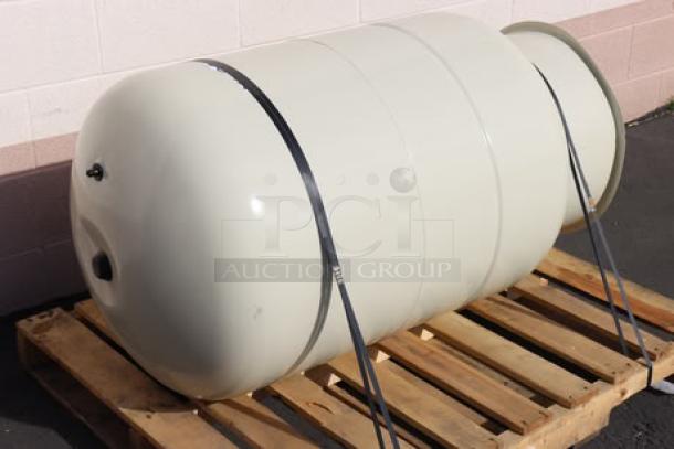 Brand new Amtrol Therm-X-Trol ST-210V 86-gallon vertical expansion tank, out of packaging, minor scratches and dents visible.