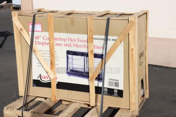 Brand new Avantco HDC-48, 48" heated display case. Packaging damaged; potential scratches/dents. 120V, 1580W counter model.
