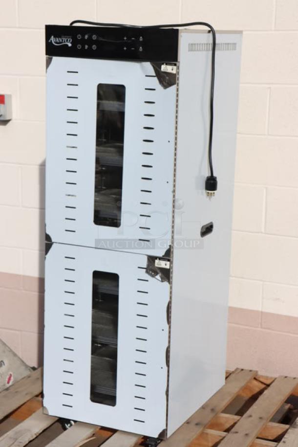 Brand new Avantco LT105 food dehydrator with 32 trays, stainless steel, minor dent, glass doors, 220V, 3000W.