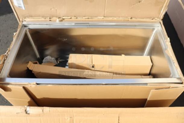 Brand new Regency PIB183616 36"x18" stainless steel portable ice bin, 155 lb. capacity, with bottle holders, minor scratches.