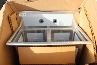 Regency 37" stainless steel two-compartment sink, model 600S21515, in new scratch-n-dent condition, 15"x15"x12" bowls.