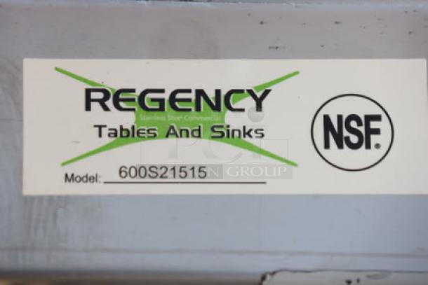 Regency 37" stainless steel two-compartment sink, model 600S21515, NSF certified, scratch-n-dent condition label visible.