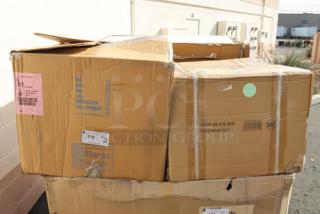 Cardboard boxes containing Delfield 240 stainless steel ice chest and Regency water station with ice bin. Box exterior is worn.