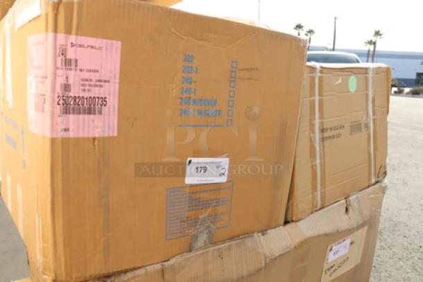 Delfield & Regency ice chest and water station boxes, labels visible, ready for auction.