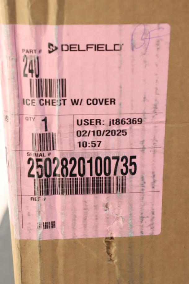 Delfield 240 stainless steel ice chest with cover; label shows part number, user info, and serial number 2502820100735.