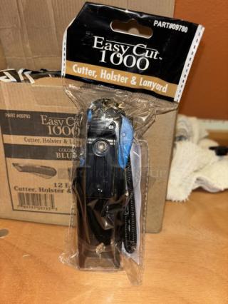 Pack of 24 Garvey CUT-40478 Safety Cutters with holster and lanyard, in original packaging, model Easy Cut 1000.